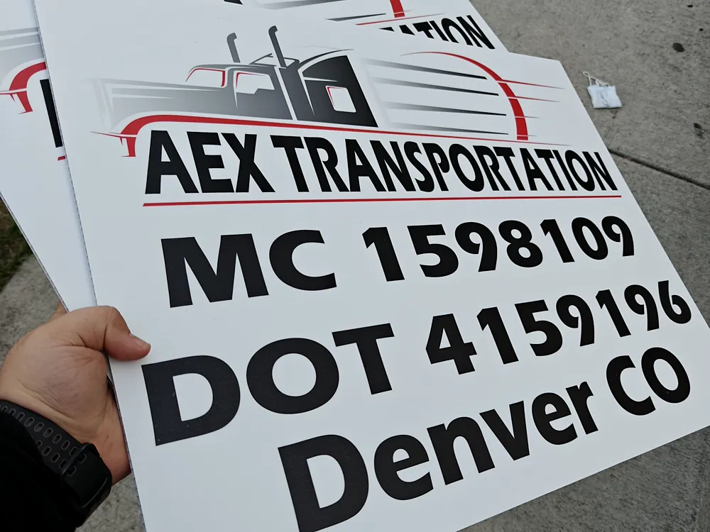 Printed magnetic vehicle panels with USDOT and MC numbers for AEX Transportation